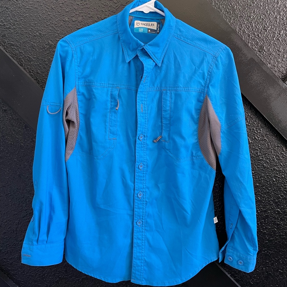 Magellan fish gear shirt. Boys size M. Blue
